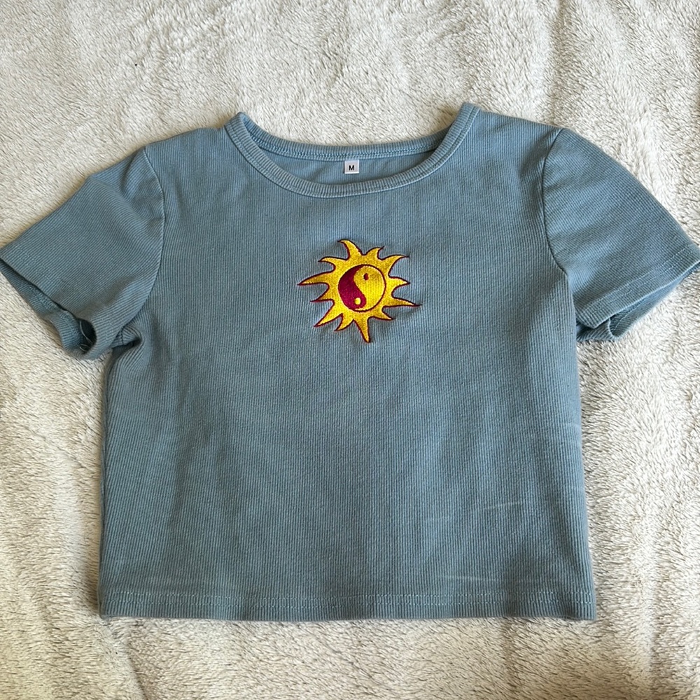Women’s blue cropped top